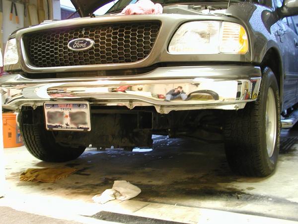 Installing license plate front bumper